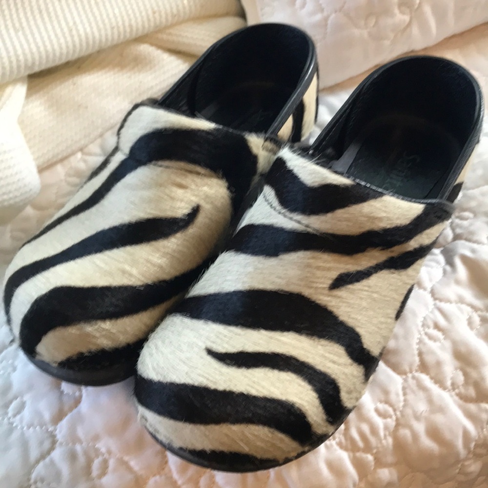 Clogs. Great condition. Worn for a day. To small.